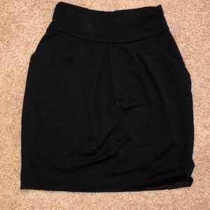 BCBG knee-length black skirt